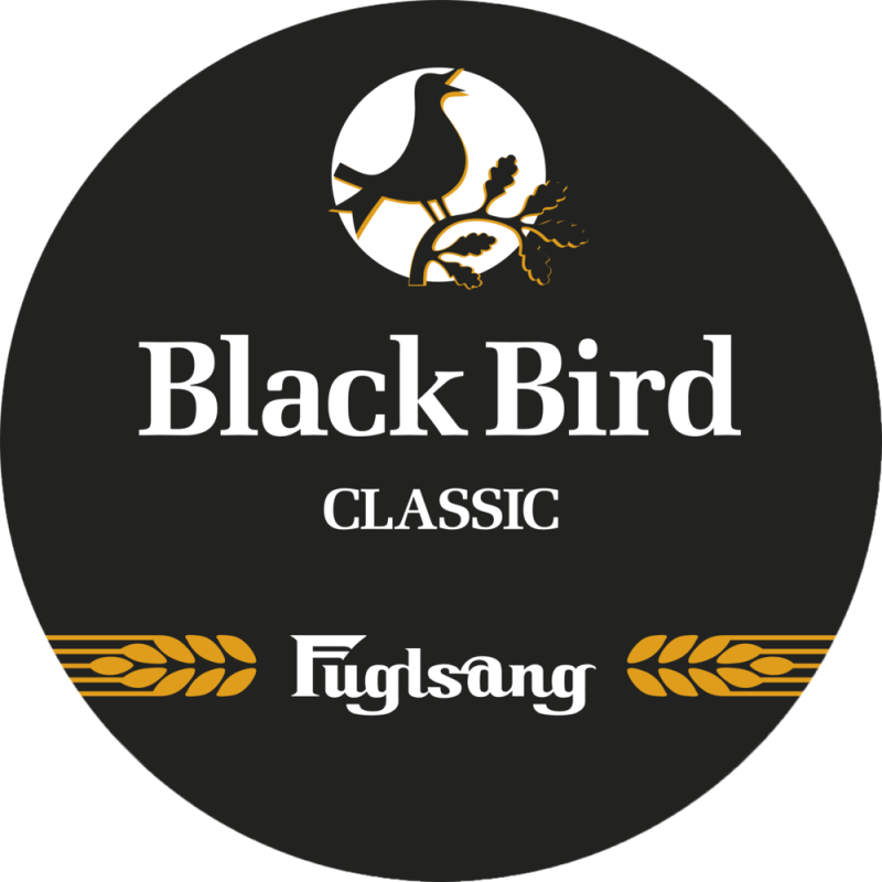 Eight shirts arranged on table in black, olive, grey, blue, white, red, mustard, and green.